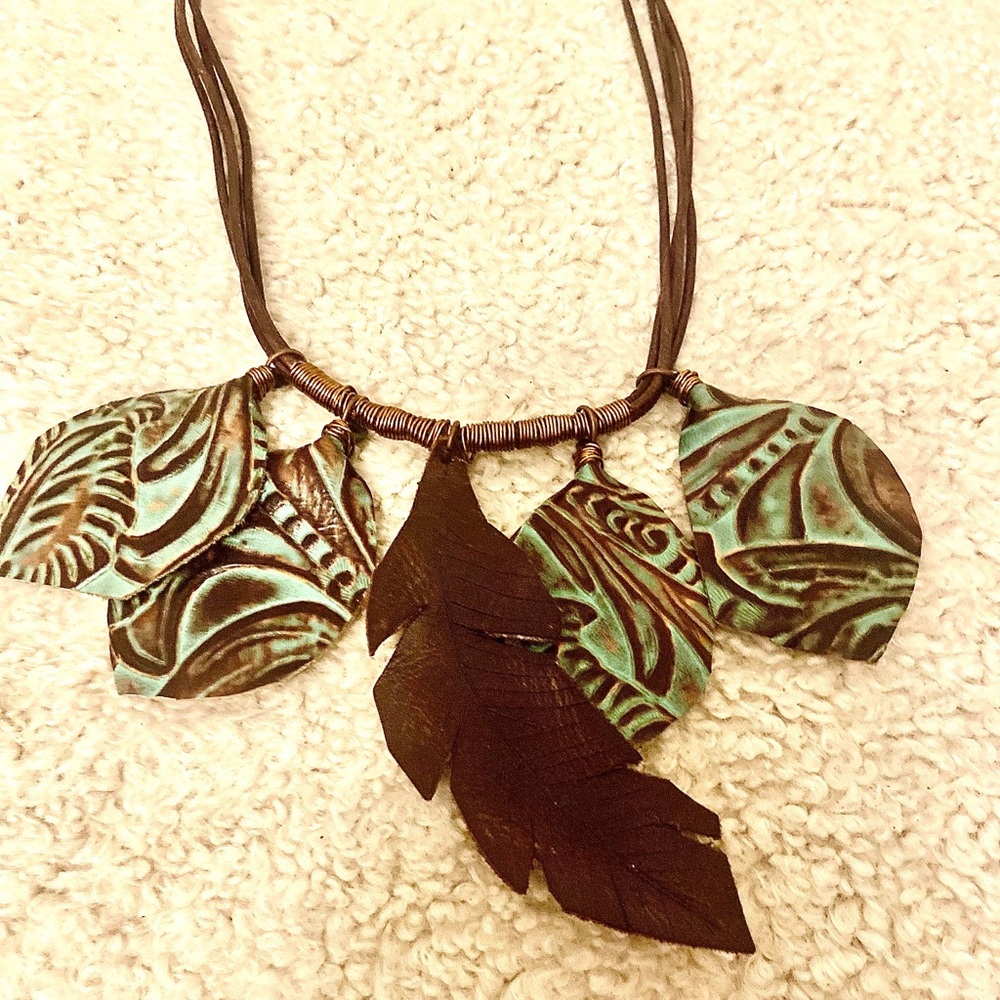 Handcrafted natural leather leaf necklace.